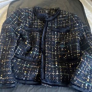 This is a blue blazer in perfect condition, size large, ideal for meeting